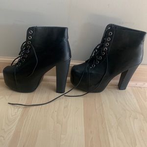 HIGH heeled ankle booties, dramatic